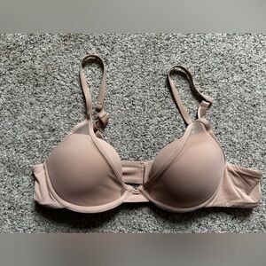 Pepper Bra size 36AA in a nude/flesh color hue